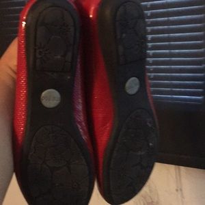 Casual flat red shoe.